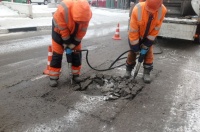 Выполнены работы по ямочному ремонту на подъездной дороге к станции Силикатная